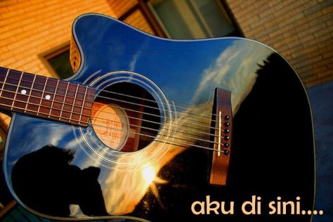 aku di sini